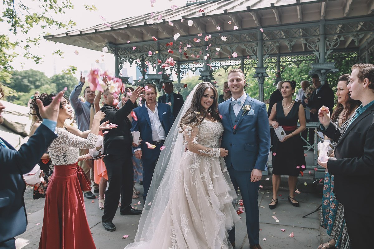 Central Park Weddings 12 summer wedding central park ladies pavilion brazilian couple and rose petals 1
