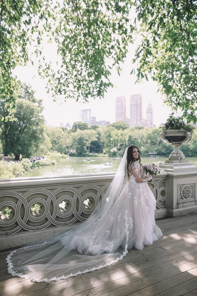 summer wedding central park on bow bridge brazilian bride in classic wedding gown
