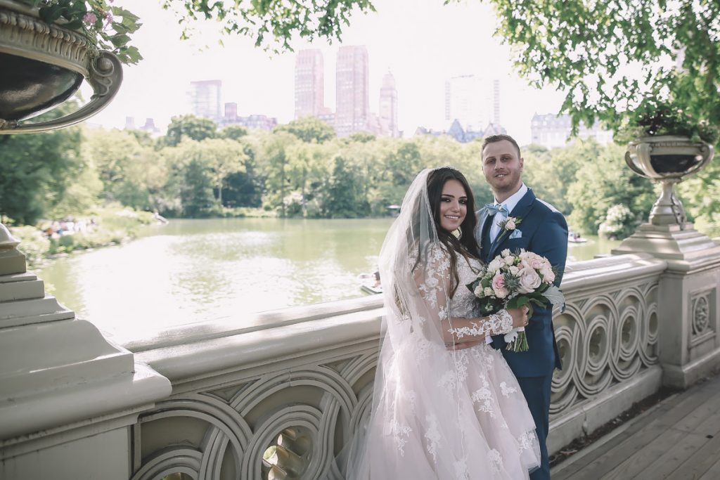 summer wedding central park on bow bridge brazilian couple